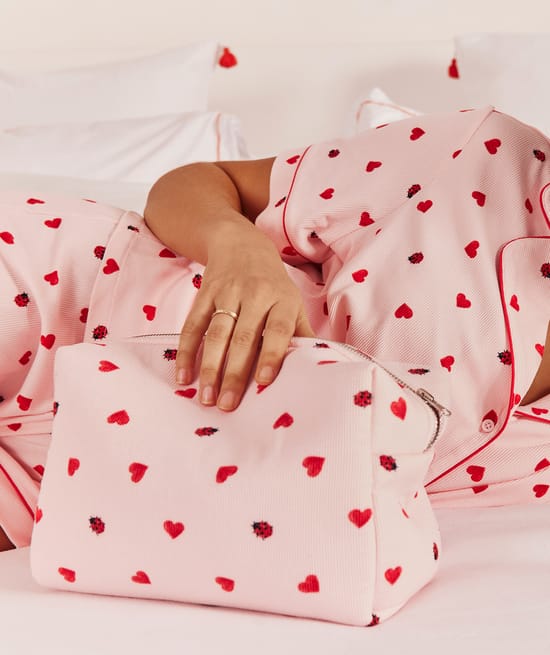 Jersey pouch with heart and ladybug patterns;