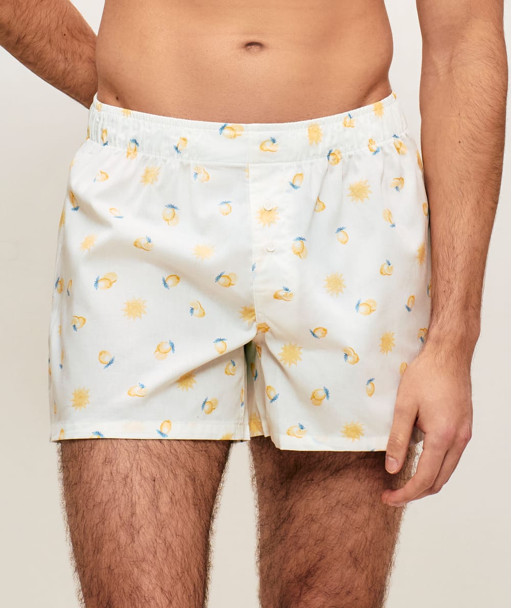 Cotton boxer shorts with lemon patterns;