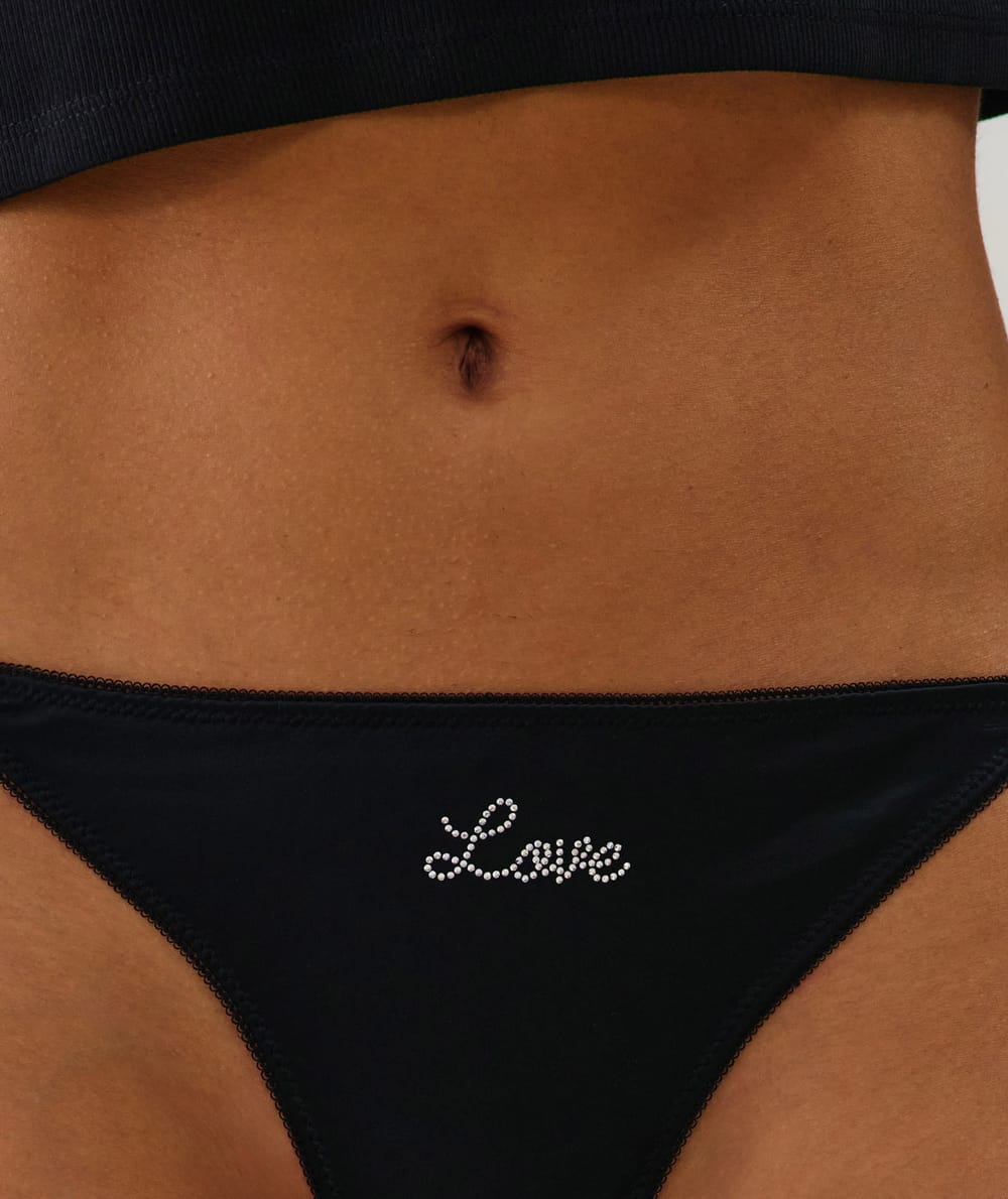 Tanga en microfibre et dentelle;