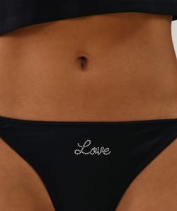 Tanga en microfibre et dentelle;