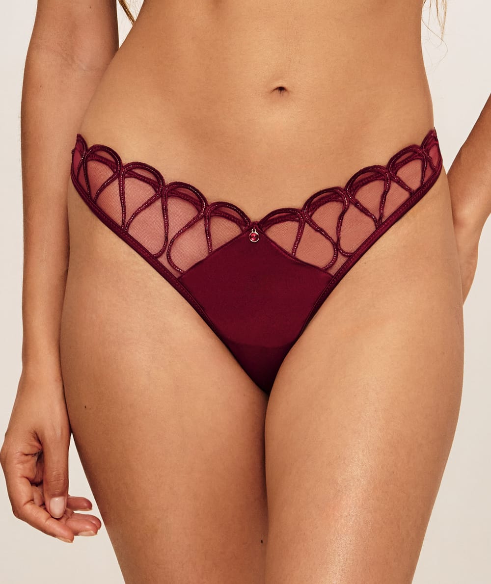 Tanga en mesh et satin avec broderie;