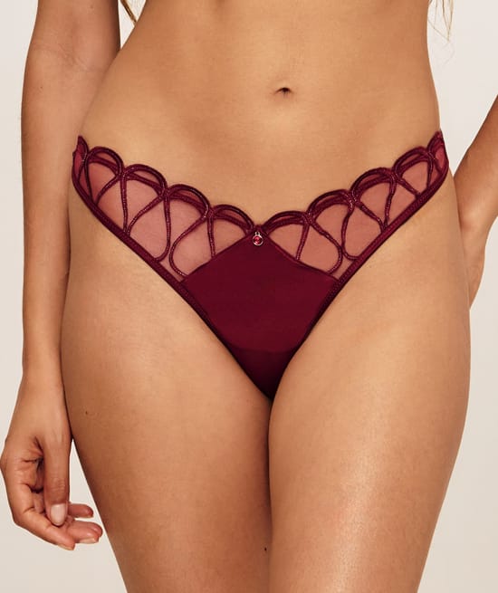 Tanga en mesh et satin avec broderie;