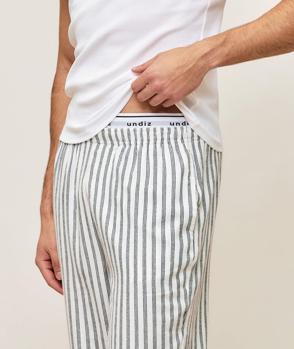 Striped flannel trousers;