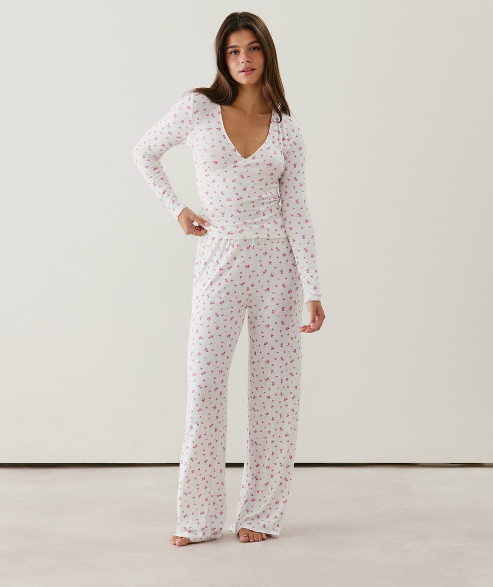 Wrap-front pointelle T-shirt with floral pattern;