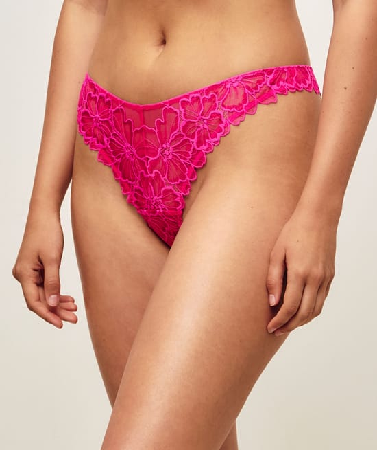 Lace string with floral embroidery;