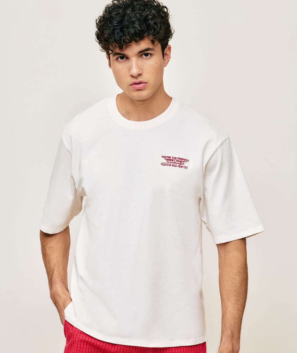 T-shirt oversize en coton avec broderie motifs et messages;