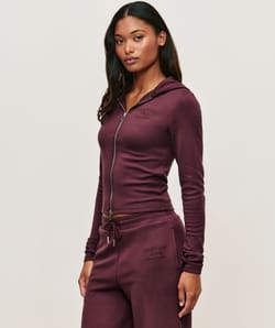 Trousers with Self Love Club embroidery;