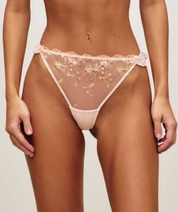 Mesh string with ruffled floral embroidery;