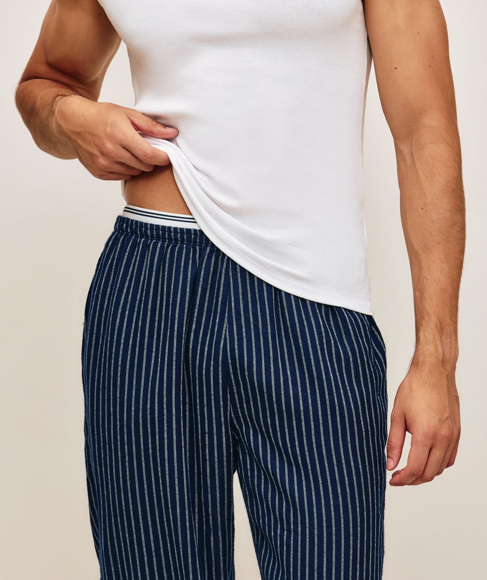 Striped pants with integrated belt;