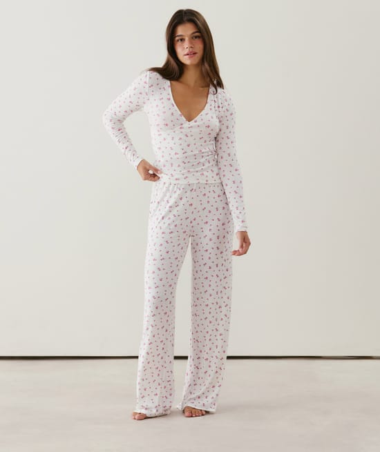 Wrap-front pointelle T-shirt with floral pattern;