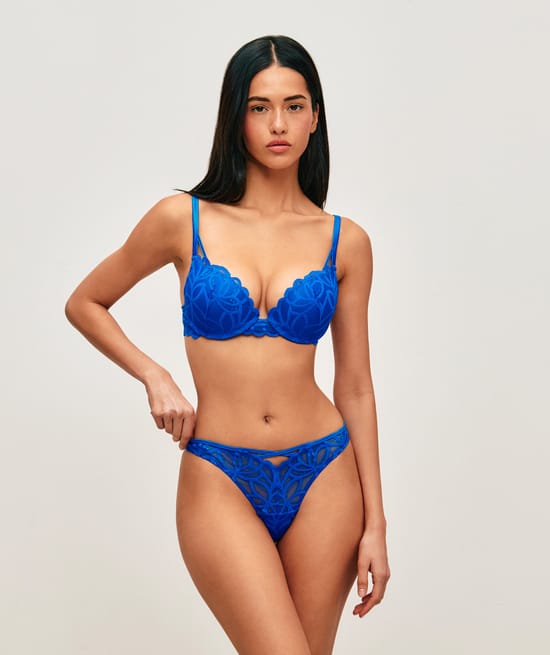 Mesh string with floral embroidery;