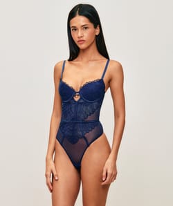 Mesh body string with floral embroidery;