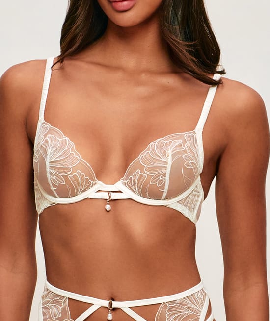 Mesh balconette bra with floral embroidery and pearl pendant;
