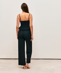 Black textured fabric pants;