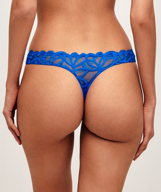 Mesh string with floral embroidery;