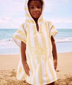 Kinderen poncho met zonnenpatroon;