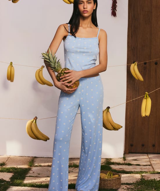 Sleeve pants in ribbed jersey with floral patterns;