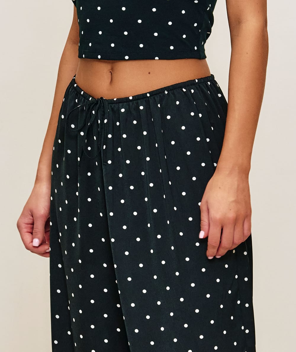 Polka dot satin balloon trousers;