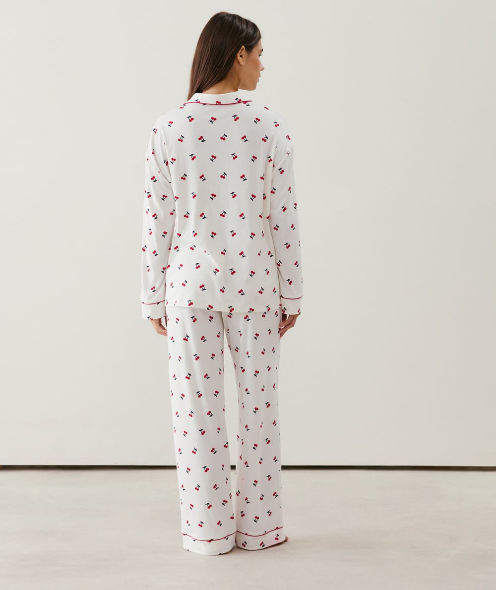 Ribbed jersey trousers with cherry pattern;