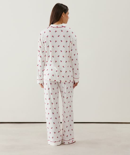 Ribbed jersey trousers with cherry pattern;