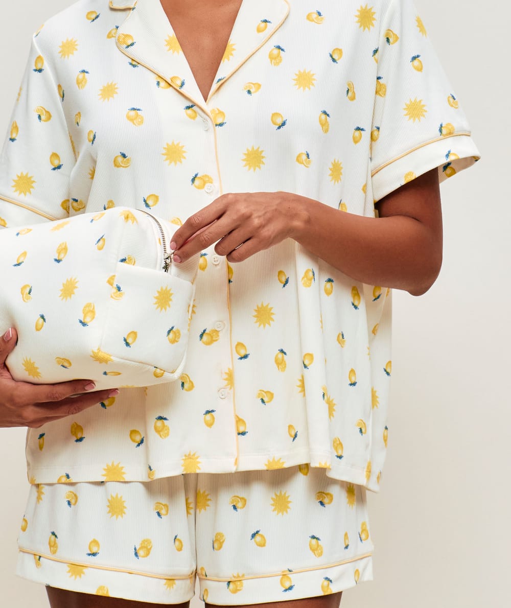 Jersey pouch with sun and lemon patterns;