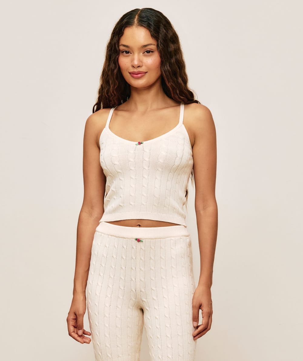 Mesh tank top with floral detail;