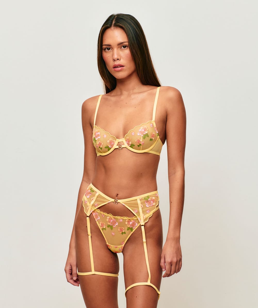 Tulle garter belt with floral embroidery;