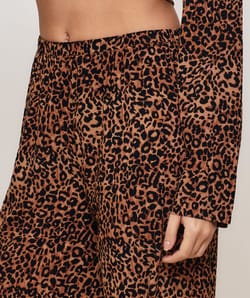 Leopard print trousers;