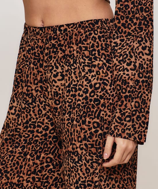 Leopard print trousers;