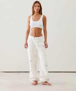 Pantalon en molleton à motifs floraux brodés;