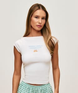 Jersey top with 'Sweet like a croissant' embroidery;
