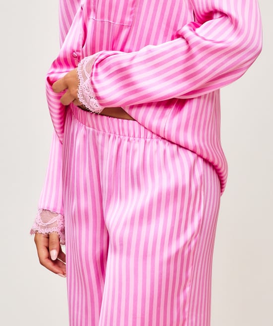 Striped satin trousers;