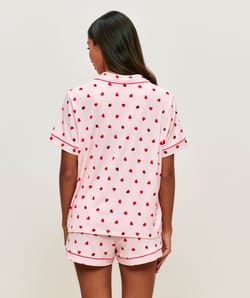 Ribbed jersey shorts with heart and ladybug patterns;