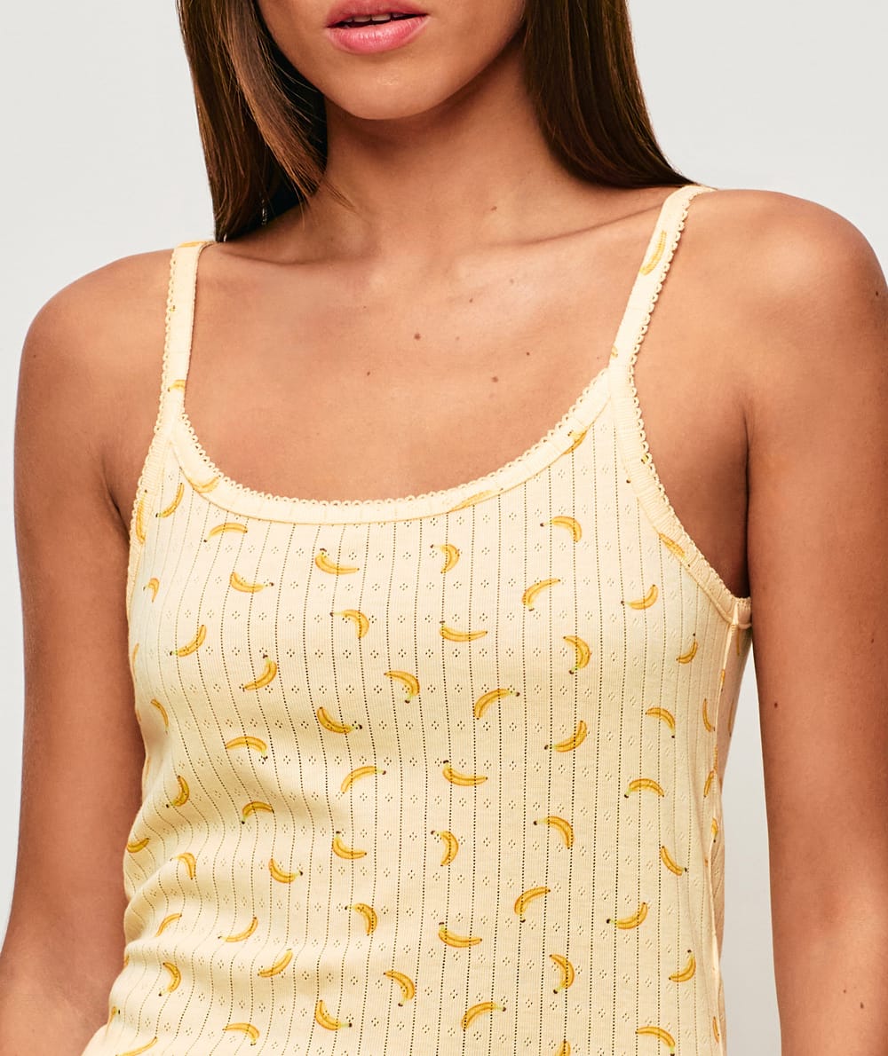 D&eacute;bardeur fines bretelles en pointelle imprim&eacute; bananes;