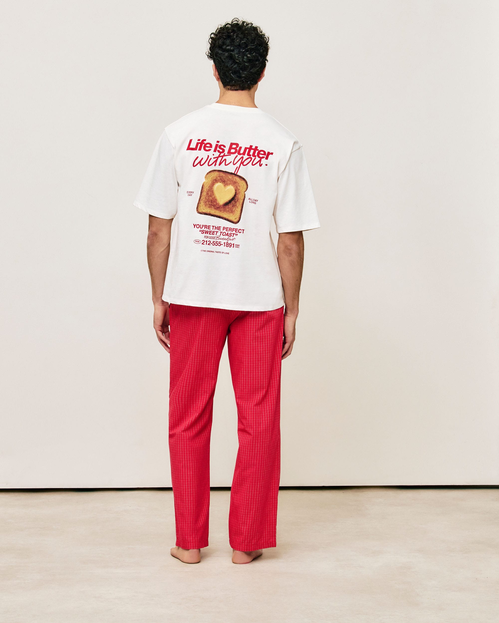 Oversized cotton T-shirt with embroidered motifs and messages