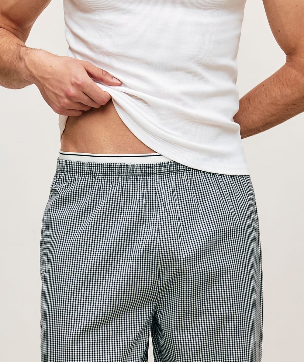 Checked poplin trousers with integrated belt;