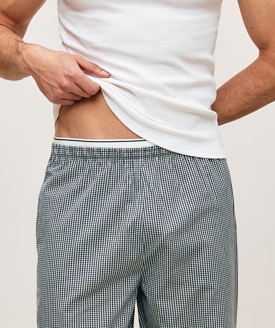 Checked poplin trousers with integrated belt;