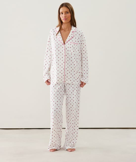 Ribbed jersey shirt with floral patterns;