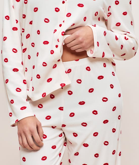 Ribbed jersey trousers with lip pattern;