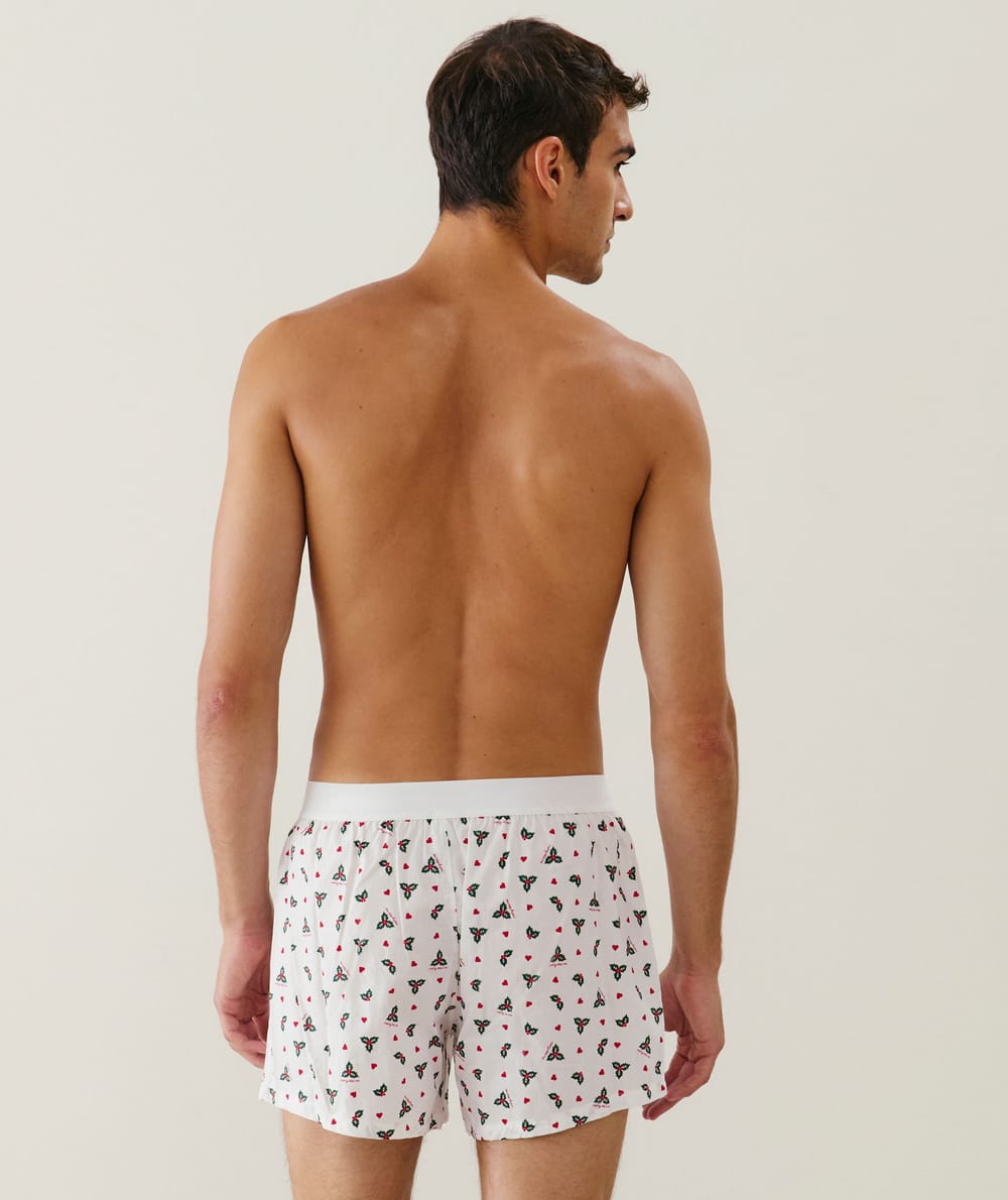 Cotton boxer shorts with holly and heart pattern;