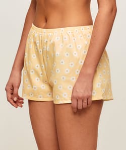 Cotton shorts with floral patterns;