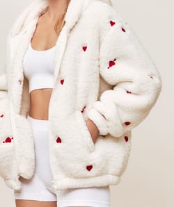 Fleece jacket with heart motifs;