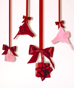 Satin and lace thong with pompom;