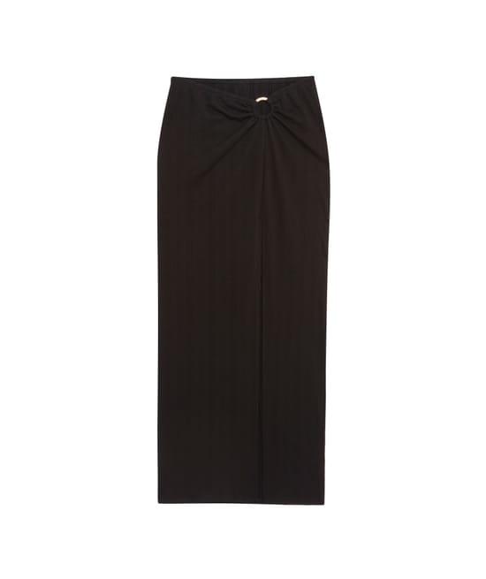 Long skirt with gold ring;