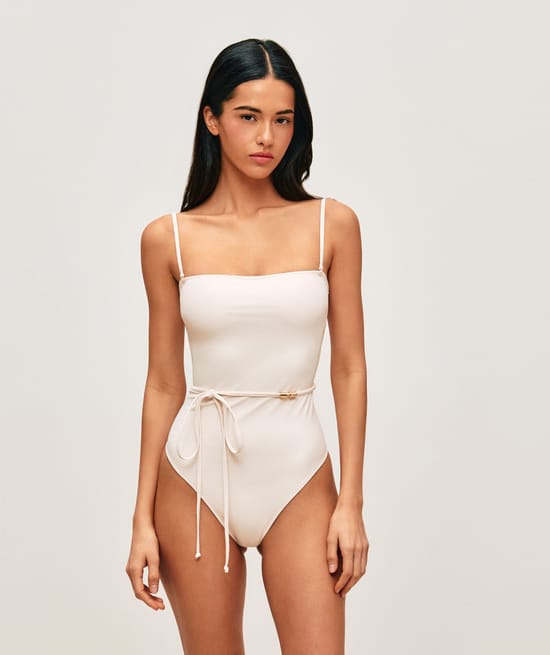One-piece swimsuit with belt and golden jewel;