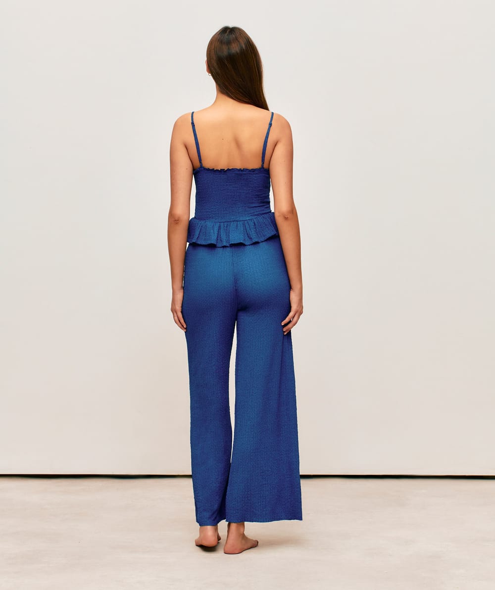 Blue textured fabric pants;