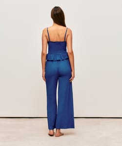 Blue textured fabric pants;