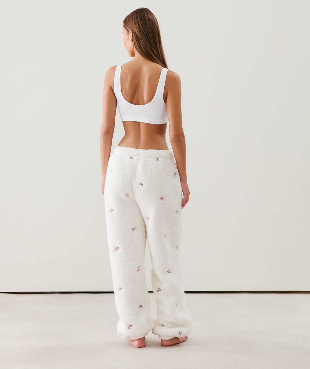 Pantalon en molleton à motifs floraux brodés;