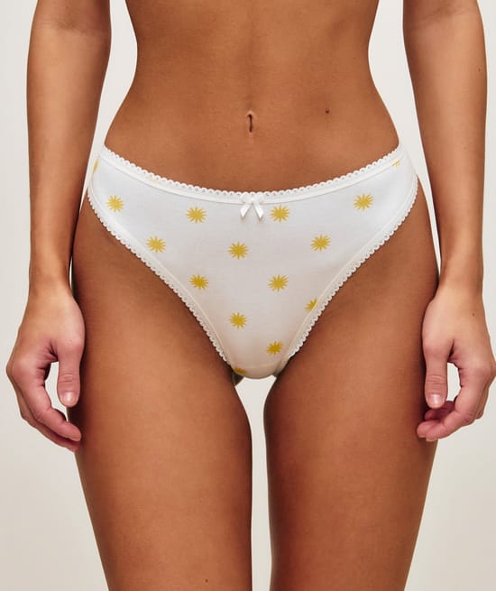 Cotton thong with sun patterns;