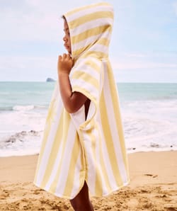 Kinderen poncho met zonnenpatroon;
